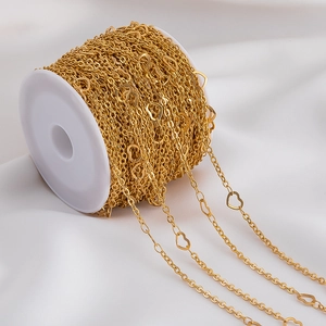 Detailed view of bulk heart-shaped gold chain spool for DIY jewelry making material