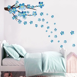 Blue plum blossom branch wall decal detail showing creative flower petals and brown twigs