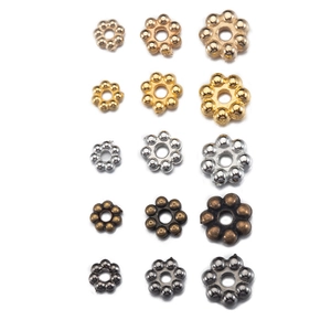 Perline a fiocco in CCB in cinque colori metallici e tre dimensioni per gioielli fai da te
