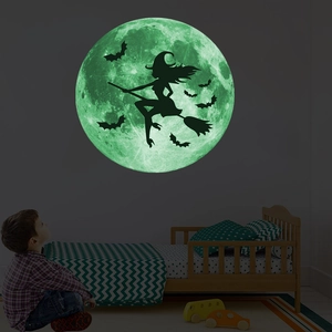 Luminous Halloween wall sticker featuring a witch on a glowing moon with black bats