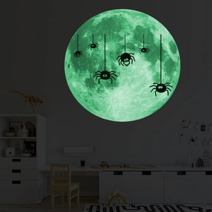 Sticker mural Halloween phosphorescent avec pleine lune et silhouettes d'araignées suspendues