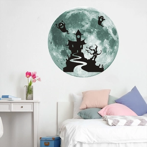 Luminous Halloween wall decal featuring a ghost castle and moon in a kids bedroom