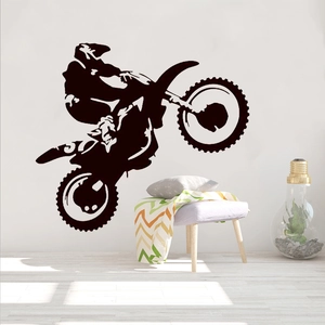 Dynamic black vinyl wall sticker of a motorcycle rider jumping for home decor