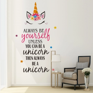 Inspirational unicorn wall sticker with motivational quotes in a modern living room setup