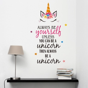 Detail of unicorn wall decal with inspirational quote for nursery room decoration
