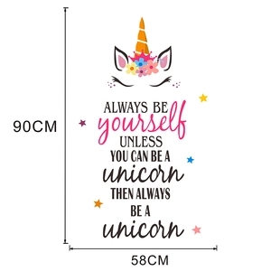 Cute cartoon unicorn wall sticker with motivational phrase measuring 90cm by 58cm