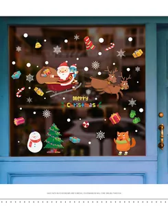 Detail view of colorful Christmas window stickers with Santa, reindeer and snowflakes