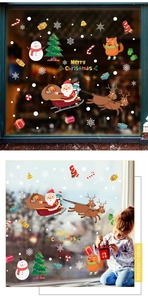 Christmas window decals with Santa, reindeer, and colorful gift boxes for glass decoration