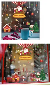 Detail view of Merry Christmas window stickers with Santa, reindeer and snowman decals