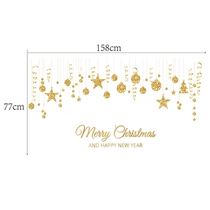 Detail of golden glitter Christmas wall decals with stars and tree motifs 158x77cm