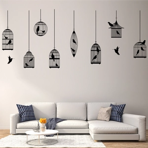 Detail of minimalist black birdcage wall stickers on a modern living room background wall