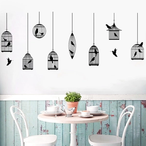 Minimalist black birdcage wall stickers set featuring birds silhouette for living room decor