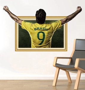 Macro view of 3D Brazil football wall sticker with player silhouette and golden frame