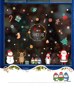 Detail of Merry Christmas window stickers featuring Santa, snowmen, and reindeer on glass