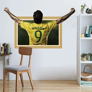 Detail of 3D football wall sticker featuring Brazil player in gold frame effect