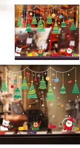 Detail view of colorful Christmas window stickers with Santa, reindeer and snowflakes