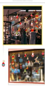Close-up of colorful Christmas window stickers with Santa, reindeer and snowflakes