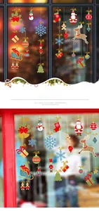 Hanging Christmas glass decals featuring Santa, reindeer, and snowflakes for holiday windows