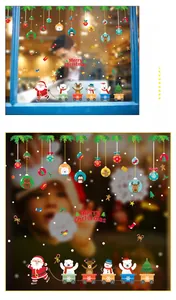 Detail of Christmas window stickers featuring Santa Claus on a train with reindeer and snowmen