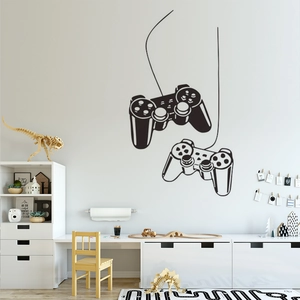 Close-up of black and white game controller vinyl wall decals in a modern playroom