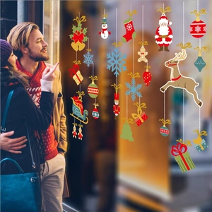 Christmas window stickers set with Santa reindeer and snowflakes for festive shop decor