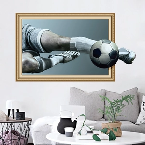 3D soccer wall sticker featuring a dynamic football player kicking through a living room wall