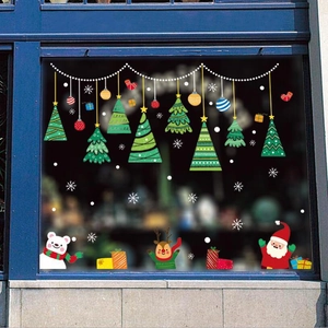 Christmas window stickers set featuring Santa, reindeer, and snowflakes on glass