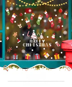 Detailed Christmas window decals showing reindeer, stockings and Merry Christmas tree