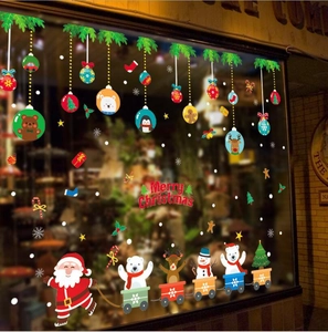 Christmas window decals set featuring Santa and reindeer with Merry Christmas typography