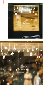 Dettaglio degli adesivi natalizi in PVC bianco con Babbo Natale, alci e fiocchi di neve
