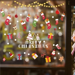 Merry Christmas festive window stickers with Santa, reindeer and colorful socks decorations