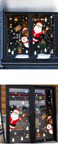 Details von Weihnachts-Fensteraufklebern mit Weihnachtsmann und Schneemann auf Glas