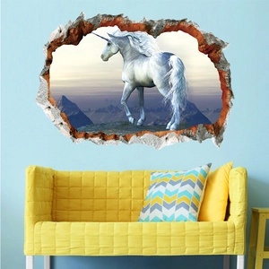 Detailansicht des 3D-Wandstickers mit einem weißen Einhorn, das durch eine blaue Wand bricht