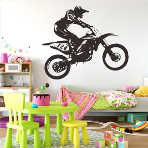 Detail of creative vinyl wall decal featuring a motocross racer silhouette and number 124