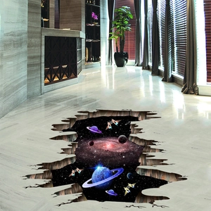 Close-up of 3D galaxy floor decal with cosmic planets and cracked surface design