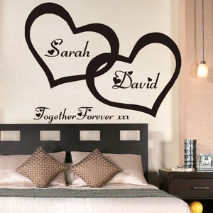 Custom vinyl wall decal with double heart design and names for bedroom wall decoration