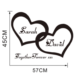 Detailed vinyl wall sticker view showing two intertwined hearts with custom names