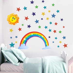 Nursery wall stickers featuring a smiling sun, colorful rainbow, and many vibrant stars