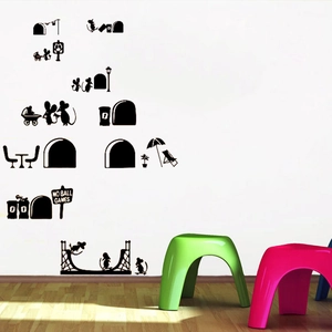 Detail of whimsical black silhouette mouse wall stickers featuring home and outdoor scenes