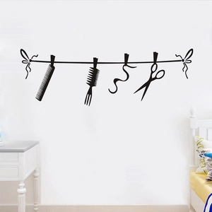 Barber shop vinyl wall sticker featuring black silhouettes of scissors and combs decor