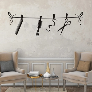 Detailed vinyl wall decal showing silhouettes of combs and scissors for hair salons