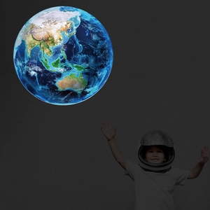 Luminous Earth wall decal showing detailed continents with child astronaut in space theme