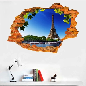 Modern living room wall decor featuring a 3D broken wall Eiffel Tower self-adhesive sticker