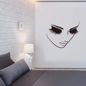 Modern black silhouette wall sticker featuring female face with long lashes for bedroom decor