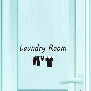 Self-adhesive black Laundry Room wall decal with clothes silhouette on a blue door