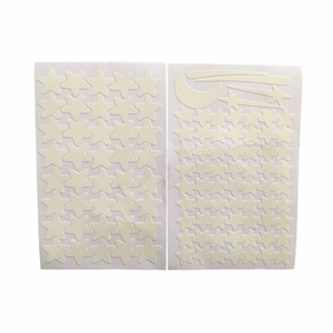 Glow in the dark wall stickers set featuring stars, moon and shooting stars patterns