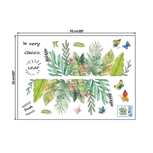 Macro view of watercolor green leaf wall decals with Monstera leaves and butterflies