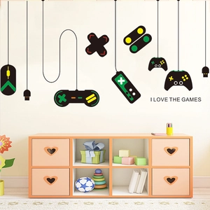Detail showing 'I LOVE THE GAMES' wall decals with colorful game controller silhouettes
