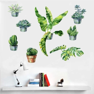 Detail showing watercolor green plant wall stickers with succulent and palm leaf patterns