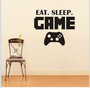 Abnehmbarer schwarzer Wandaufkleber Eat Sleep Game mit Controller-Silhouette Motiv